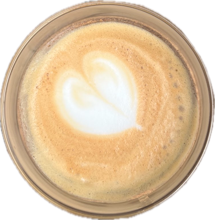 A flat white with a heart poured in the foam, seen from above
